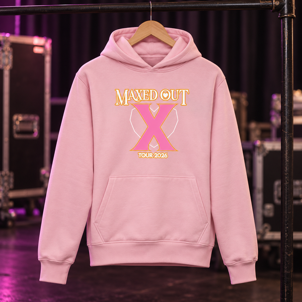 Pink X Tour 2026 hoodie hanging on a rail
