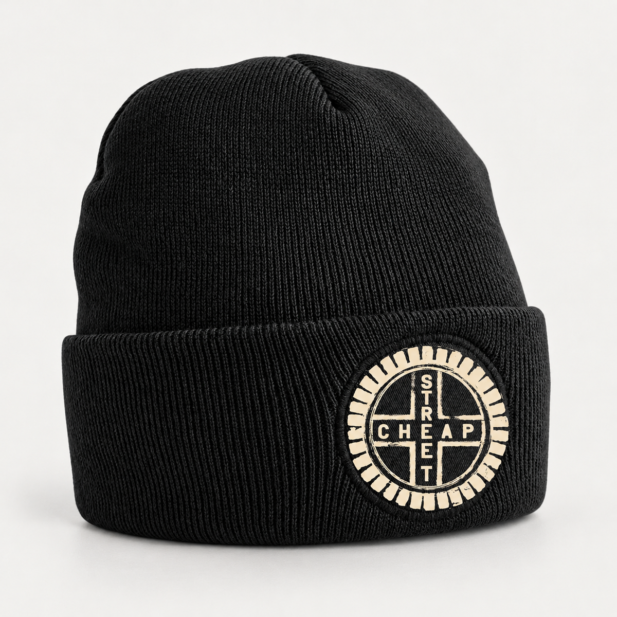 Cheap Street logo beanie in black with the circular Cheap Street emblem in warm cream on the cuff