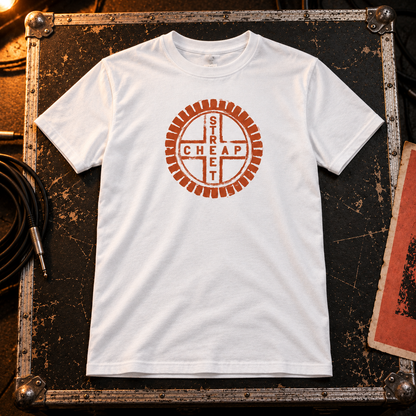 Cheap Street logo T-shirt in white with the terracotta Cheap Street emblem on the chest, laid on a flight case